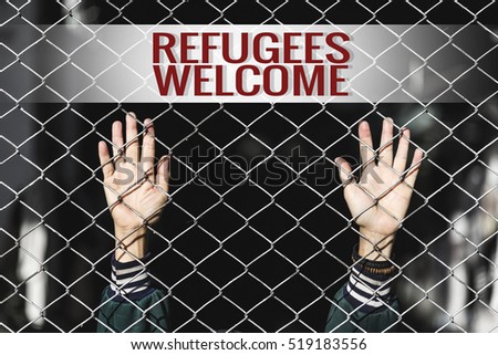 Refugees Welcome text of women and fence. Refugee concept