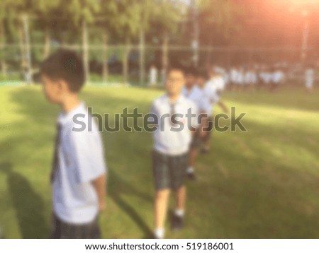 Blur kids and teacher in the playground activity for background usage.