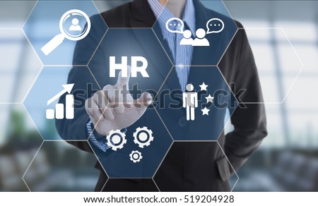 Businessman hand pressing button human resources. sign on virtual screen. business concept. Royalty-Free Stock Photo #519204928