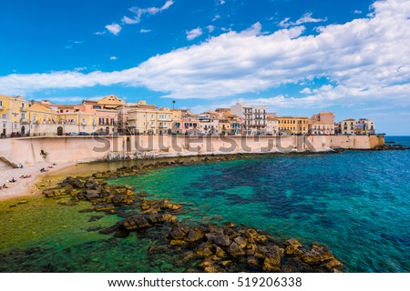 Coast of Ortigia island at city of Syracuse, Sicily, Italy. Beautiful travel photo of Sicily. Royalty-Free Stock Photo #519206338