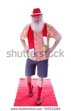 Hipster Santa Claus walks the Red Carpet in his Fashion Red Carpet Photo Shoot. Isolated on white with room for your text.