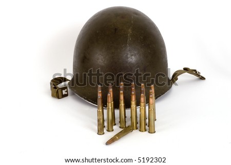 army helmet with  bullets standing  on white background