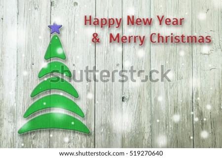 New Year and Christmas conceptual tree on an wooden background.