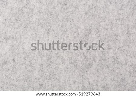 Fragment of grey thick felt material. High resolution photo.