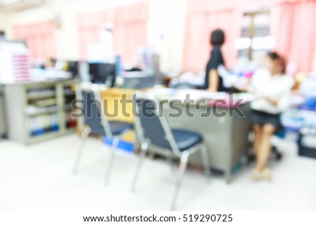 Blur image of activity in the office ,use for background.