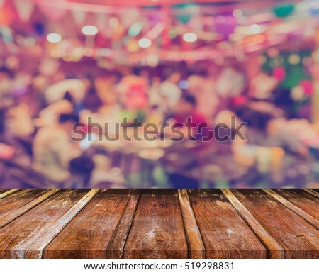 blur image of Tables and decoration prepared for birhtday party for background usage. (vintage tone).