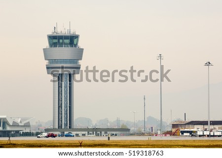 Airport control tower at Sofia's airport in a foggy weather.