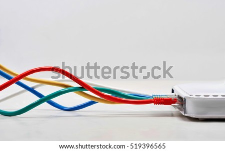 Ethernet Cables Plugged In
 Royalty-Free Stock Photo #519396565
