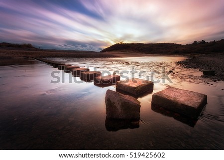 Three Cliffs Bay stepping stones
Sunset at the stepping stones that allow access to the divided beaches at Three Cliffs Bay on the Gower peninsula in Swansea, South Wales
 Royalty-Free Stock Photo #519425602