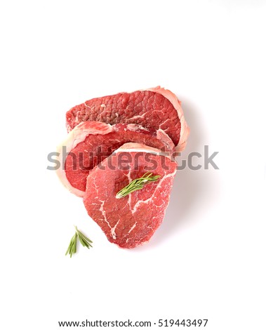 Raw  marbled beef on a  a white background Royalty-Free Stock Photo #519443497