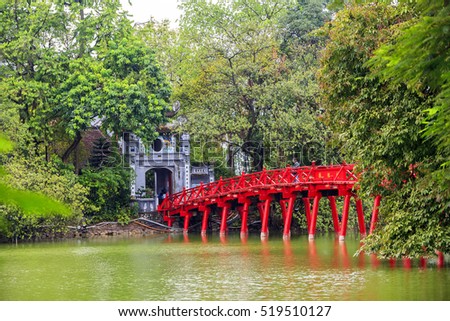 Red Bridge- The Huc Bridge in Hoan Kiem Lake, Hanoi, Vietnam on nov 18, 2016. This is a lake in the historical center of Hanoi, the capital city of Vietnam Royalty-Free Stock Photo #519510127