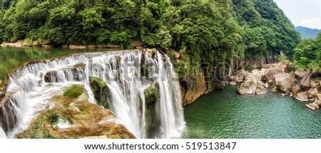 Shifen waterfall scenery, Shifen Waterfall is a scenic waterfall located in Pingxi District, New Taipei City, Taiwan, on the upper reaches of the Keelung River.