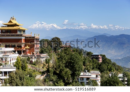 General view of  Thrangu Tashi Yangtse Monastery with the Himalayas in the background Royalty-Free Stock Photo #519516889