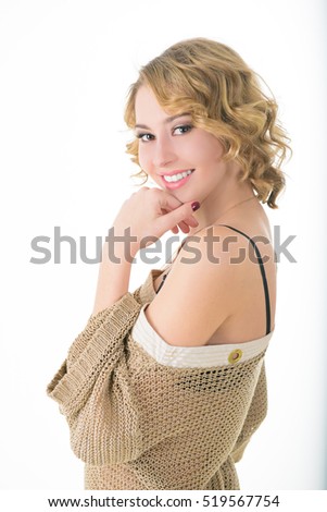Beautiful blonde girl on a white background. teen girl beautiful cheerful enjoying isolated on white background