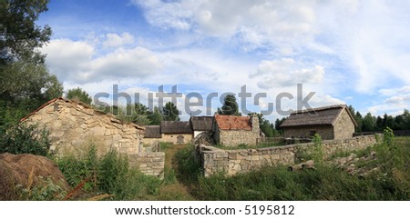 Old historical farmstead with stone buildings (Ukraine, preceding century). Five shots composite picture.