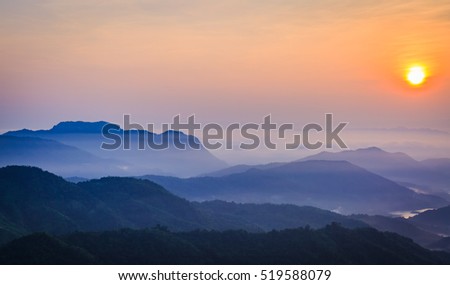 beautiful sunrise over the mountain at the north of thailand