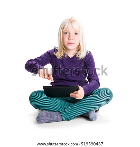 young girl with a tablet isolated on white