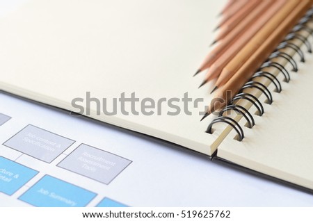  Wooden pencils on blank note book with copy space,use for backdrop or add your text.