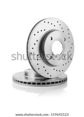 Brake discs isolated on white  Royalty-Free Stock Photo #519642523
