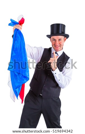 magician shows trick with cloth Royalty-Free Stock Photo #519694342