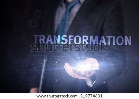 Businessman Use Smartphone And Selecting Transformation, Touch Screen. Virtual Icon. Graphs Interface. Business concept. Internet concept. Digital Interfaces