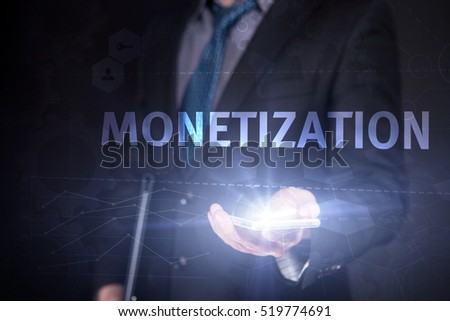 Businessman Use Smartphone And Selecting Monetization, Touch Screen. Virtual Icon. Graphs Interface. Business concept. Internet concept. Digital Interfaces