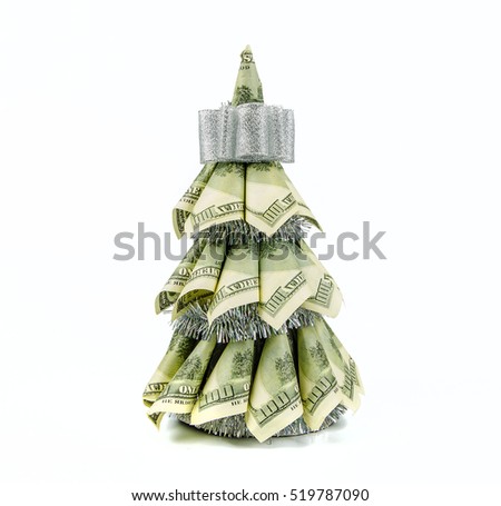 christmas tree by dollars on white background