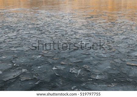 Ice cracked dangerous on the pond in November