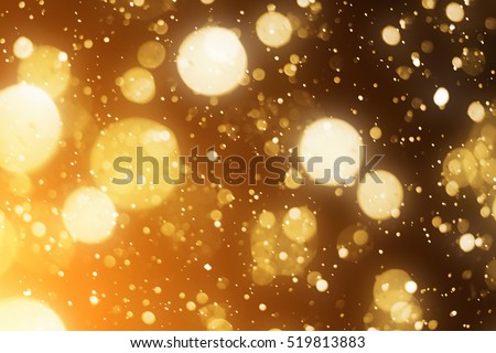 Golden background. Defocused lights Royalty-Free Stock Photo #519813883