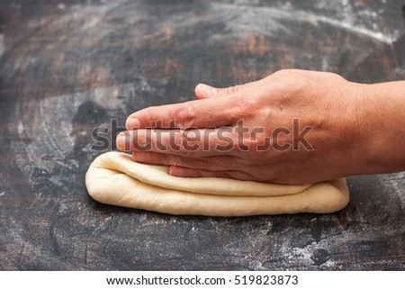 Step by step preparation of bread. French baguette. Forming "Tail of the Dragon". bread cooking. 