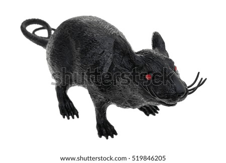 A black plastic toy rat isolated on a white background.