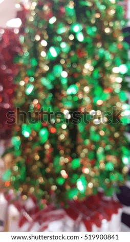 Blurred background of the christmas tree with a bokeh light.