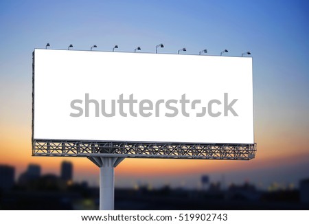 Blank billboard at twilight for design work Royalty-Free Stock Photo #519902743