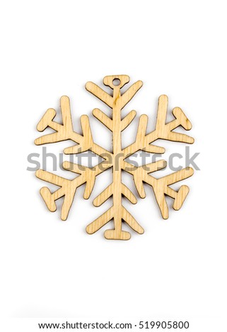 Winter,Christmas, New Year wooden decoration - snowflake, star. Isolated on white background. Top view. Closeup.
