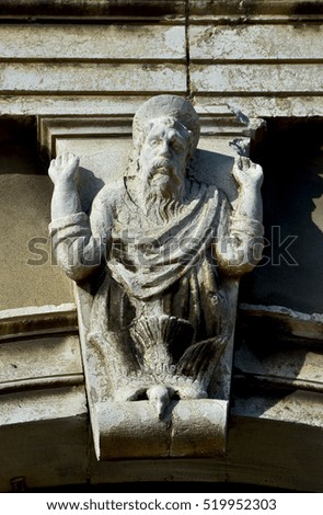 Ancient relief of Holy Spirit descending from God in the form of a dove