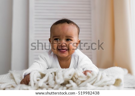 Portrait of a mixed race baby boy Royalty-Free Stock Photo #519982438