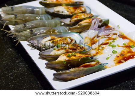 seafood place on a plate for grilled on charcoal