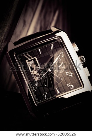 wristwatch on a black Royalty-Free Stock Photo #52005526