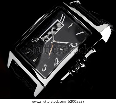 wristwatch on a black Royalty-Free Stock Photo #52005529