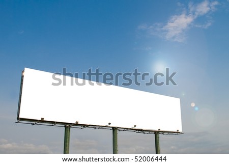 Big white blank billboard with blue sky and sun backdrop