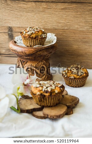 gluten-free muffins with pumpkin, lemon, dates and sunflower seeds, healthy vegan baking, selective focus