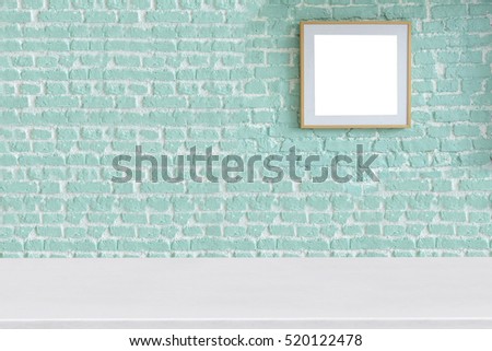 Empty green brick wall living room decoration and interior design, white wooden table and large frame