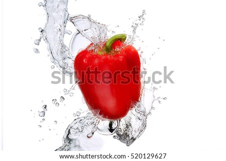 Water splash and vegetables isolated on white backgroud with clipping path. Fresh bell pepper