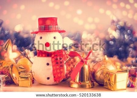 snowman merry Christmas and bokeh background .warm tone 