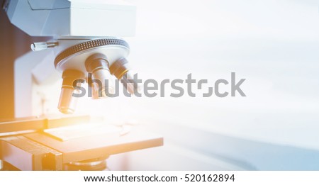 laboratory, microscope for chemistry biology test samples,examining  liquid,Medical equipment,Scientific and healthcare research background.vintage color Royalty-Free Stock Photo #520162894