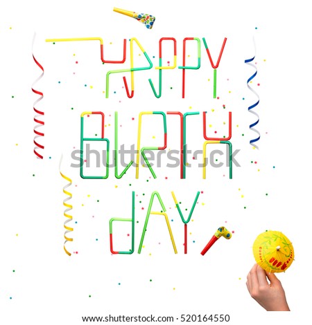 Creative still life photo of happy birthday sign made of cocktail straws with confetti and serpentine isolated on white.