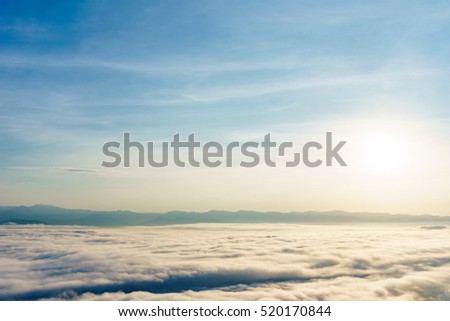 Morning sky and fog on winter season in Thailand Royalty-Free Stock Photo #520170844