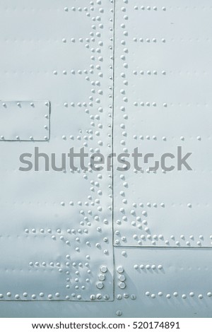 texture of covering the plane with buttons