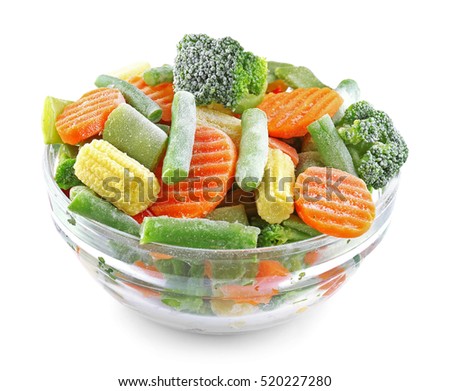 Bowl with frozen vegetables isolated on white