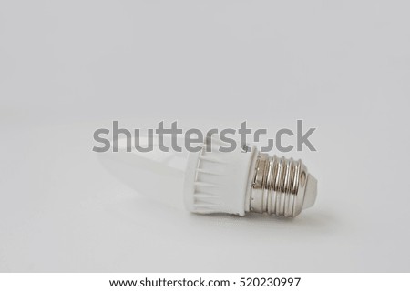 LED bulb 60 V 6 Watt E27 on white background.